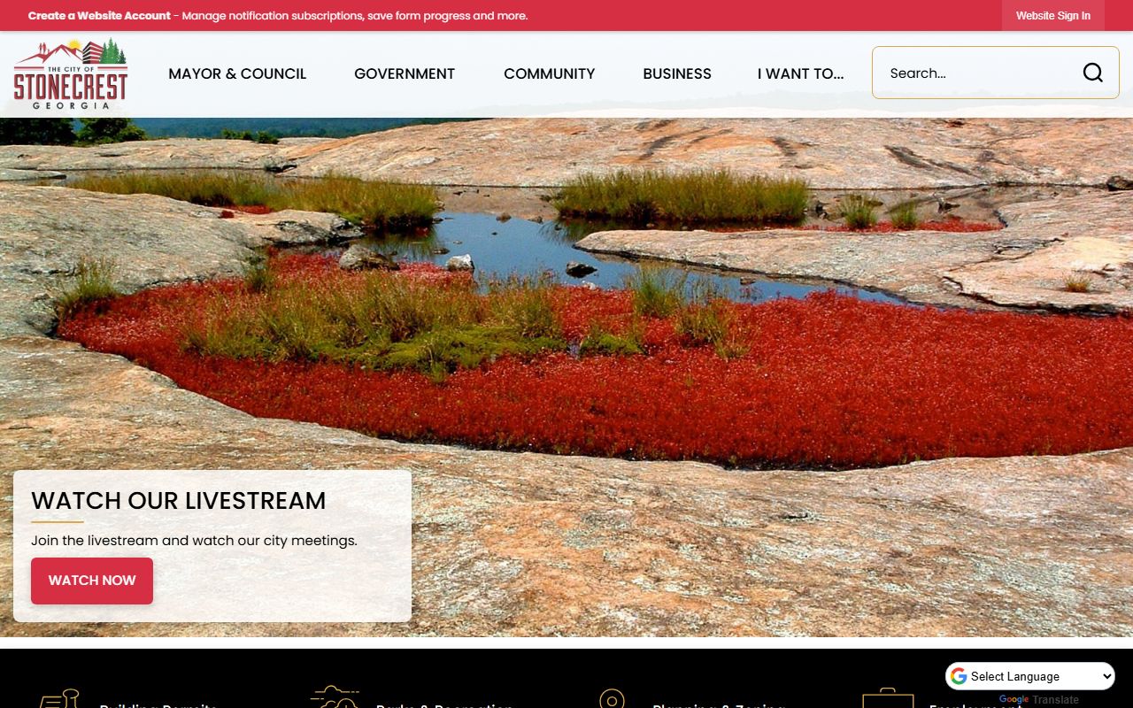 Stonecrest city website showing police services and links to DeKalb County booking report resources